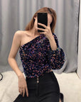 Sequined Asymmetric Top